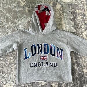 Cropped London sweatshirt. New, hardly worn.